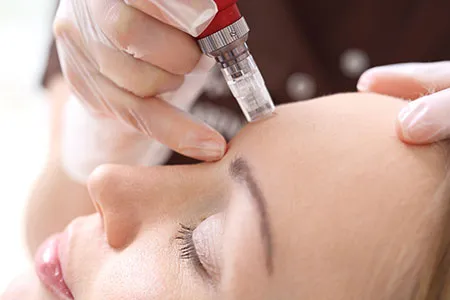 Woman getting forehead injection